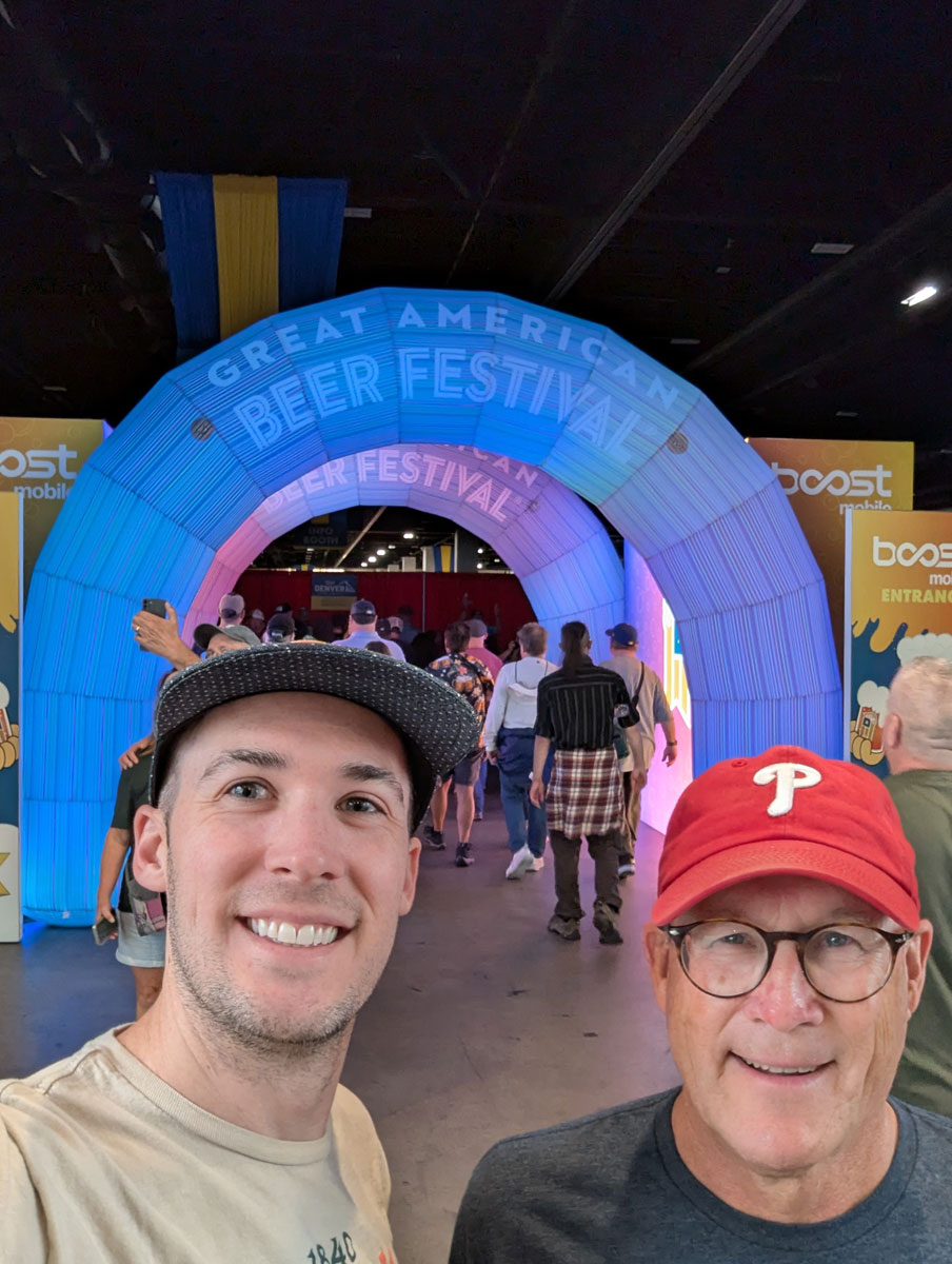 Certified Cicerone® Ben Hock and his dad at the entrance to the 2025 Great American Beer Festival in Denver, CO